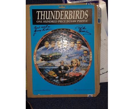Gerry Anderson and Sylvia Anderson signed Thunderbirds jigsaw puzzle. Spectrum International one hundred piece jigsaw puzzle 