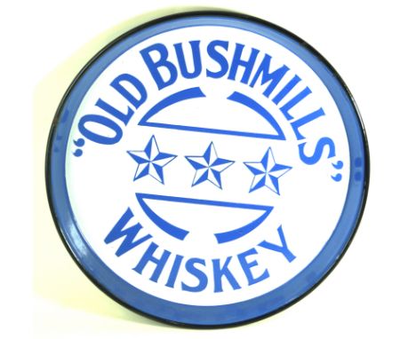 An original advertising enamel pub tray of circular form"Old Bushmills" Whiskey, stamped verso J.A. Campbell & Son Belfast, d