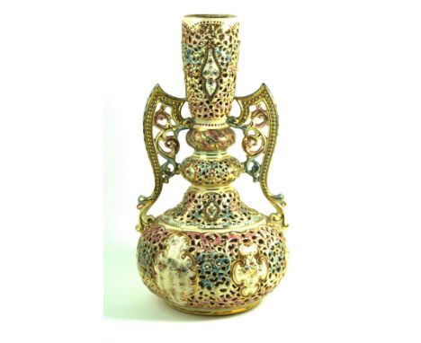 A large and impressive Fischer Zsolnay Pecs twin handled vaseHaving pierced floral decoration throughout with hand-painted pa