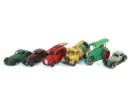 Six unboxed Dinky diecast vehiclesComprising three early saloon cars in green grey and brown, Bedford refuse wagon, early red