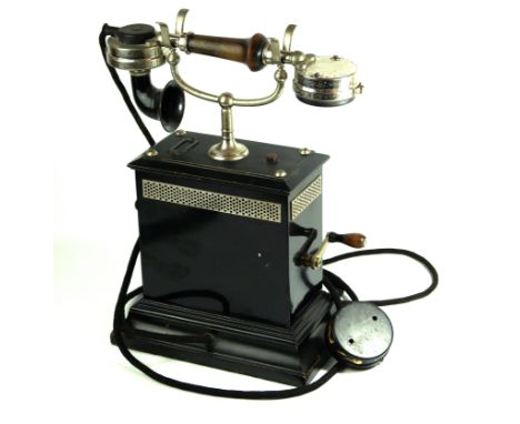 An early 20th Century Ericsson telephoneWith black lacquered base unit, height 33cm   CONDITION REPORT:  Lot 103One handle at