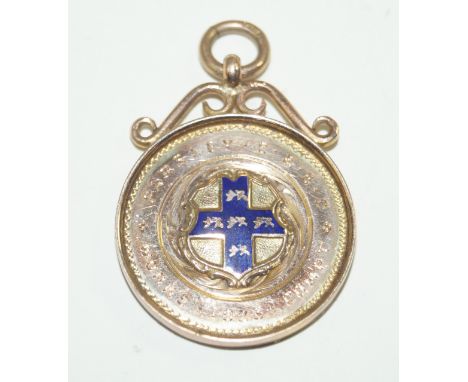 A 9ct gold and enamel cricketing prize medal, dated 1923Awarded to D. T. Marsden by the Phoenix Work cricket club, approx wei