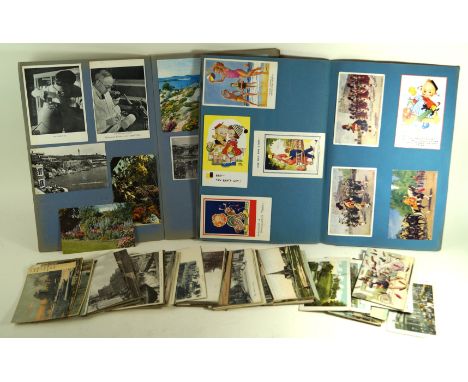 A collection of approx 1000 postcards, mostly early 20th CenturyContained in three albums, together with loose examples, subj