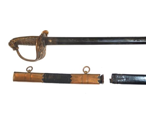 A British Naval Officer's sword, late 19th/early 20th Century71cm single edged single fullered blade, with brass guard with d