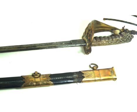 A British Naval officers sword, early 20th Century75cm single edged single fullered curved blade, solid brass grip decorated 