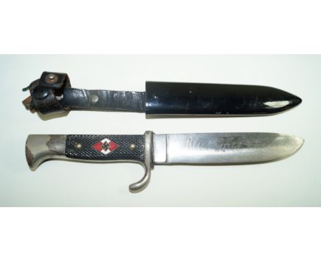 A Nazi Germany Hitler Youth knifeThe single edged 13.5cm blade, with inscription 'Blut Und Ehre! (Blood and Honour)', with kn