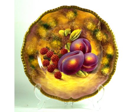 A Royal Worcester hand-painted cabinet plateDecorated with fruit by J Smith, black factory marks to base, diameter 23cm    CO