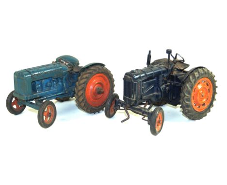 Two unboxed Chad Valley Fordson Major tractorsOne mid blue with orange hubs and black tyres, the other dark blue with crank h