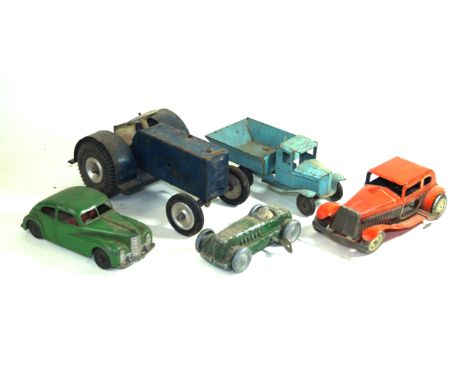 A clockwork diecast Gaiety Toy Castle Art Product racing car In green livery and four tinplate vehicles comprising a push alo