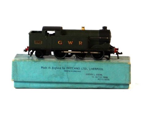 A boxed Hornby Dublo three rail post-war EDL7 0-6-2 electric tank locomotive no.6699In green GWR livery - light blue pre-war 