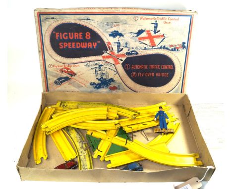 A boxed Louis Marx 'Figure Eight Speedway' setWith yellow track, two tinplate clockwork cars and instruction leaflet, with au