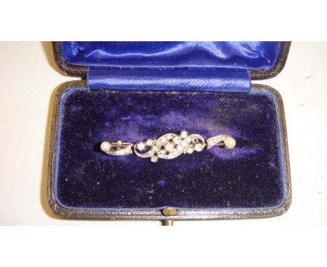 Vintage unmarked gold brooch set with 25 diamonds with seed pearls in presentation case