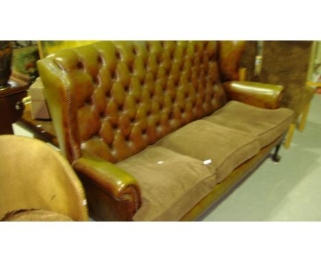Vintage button back three seater Queen Anne style sofa on carved ball and claw feet