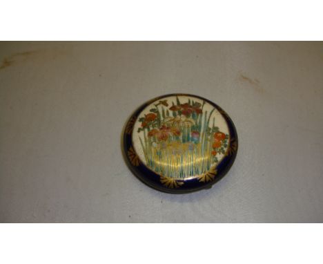 Vintage Japanese Satsuma porcelain plaque decorated with irises and other flowers mounted on silver back as a buckle