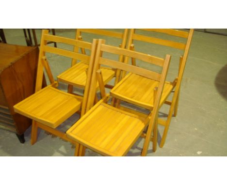 Set of four vintage folding hall chairs