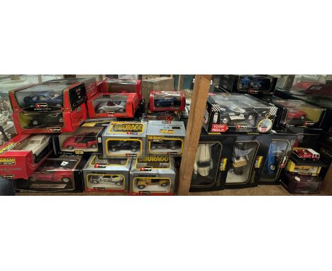 A large collection of Burago and other model cars including Ford AC Cobra 427, Ford Street Ka, Porsche 911S, Mercedes Benz 30