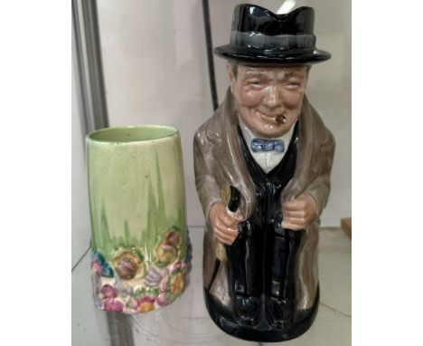 A Clarice Cliff moulded vase together with a Royal Doulton Winston Churchill toby jug