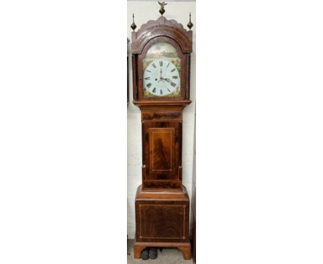 A 19th century mahogany longcase clock, the hood with an arched top and rope twist columns above a short trunk door, box base