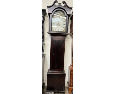 A 19th century longcase clock, the hood with a broken swan neck pediment above a long trunk door, box base and plinth, the 33