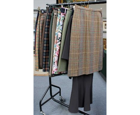 Ladies Skirts, including: Daks, Lucia, Laird-Patch of Scotland, Eugen Klein, Bianca, etc, mainly size 12 (12 skirts and a dre