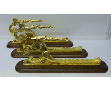Three gilt metal lamp brackets