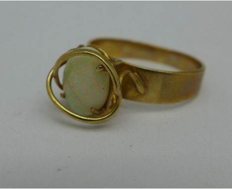 A 9ct gold and opal ring, 2.6g, M