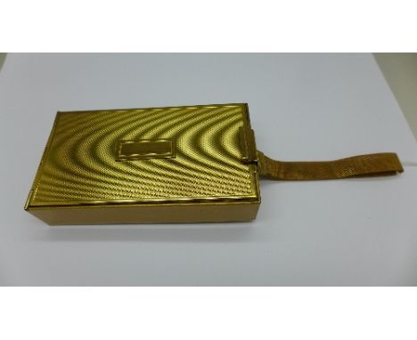 A combination compact, powder, comb and cigarette case, marked Park Lane