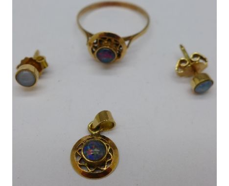 A 14k gold and opal ring, earrings and pendant set, 3.0g, M