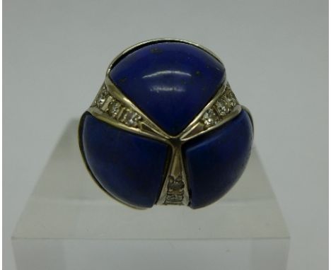 An 18ct white gold, lapis lazuli and diamond ring, 14.6g, Q, the shank marked Krauss