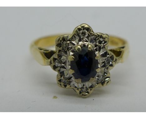 An 18ct gold, sapphire and diamond ring, 2.9g, N