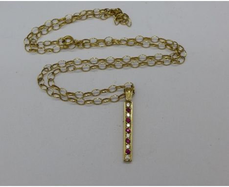 A 9ct gold, diamond and ruby pendant on a 9ct gold chain, 4.2g