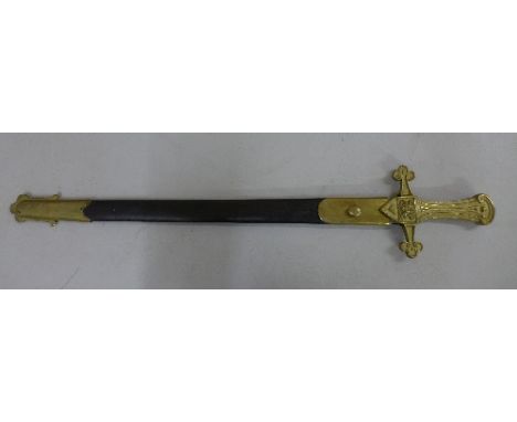 A short sword with brass handle and with scabbard