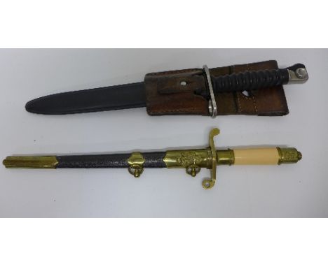 A dagger with scabbard and frog and a Naval dagger with scabbard