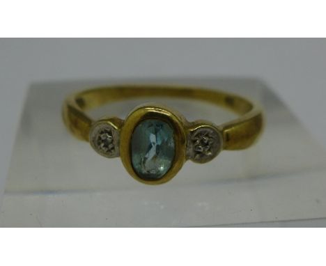 A 9ct gold, blue stone and diamond ring, 1.8g, M