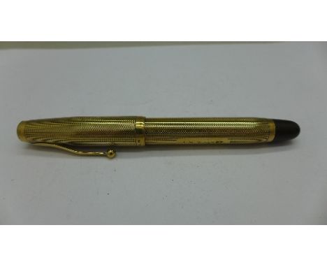 A 9ct gold pen with 14k nib, Walker of Hall, with inscription dated 1953, total weight 22.7g