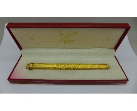 A Cartier ballpoint pen, boxed