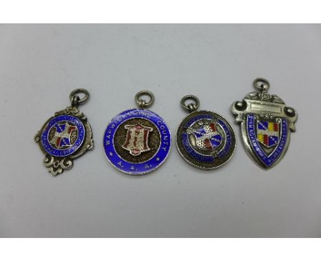 Four silver and enamel fobs, 61.5g