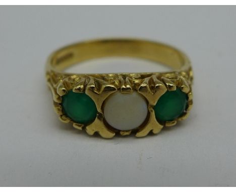 A 9ct gold, opal and green stone ring, 3.3g, O