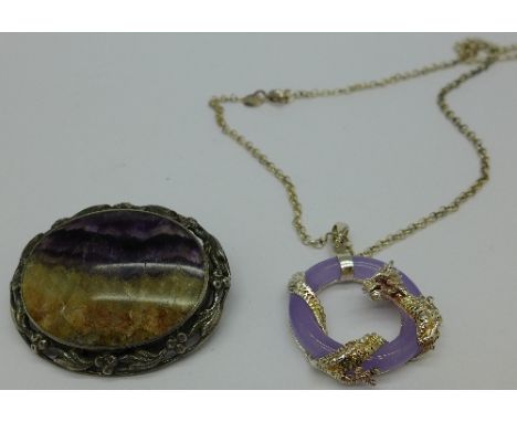A silver mounted Blue John brooch and a silver and jade pendant with chain