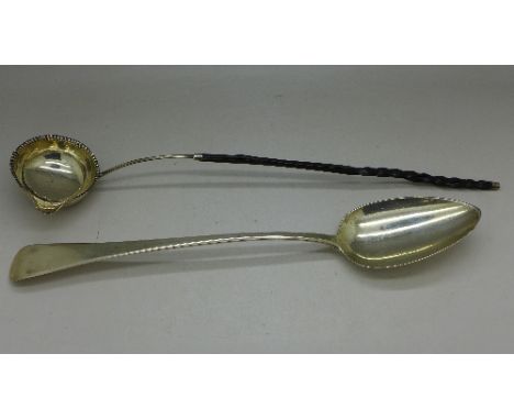 A George III silver serving spoon, London 1808, 75g and a Georgian silver toddy ladle, worn London hallmark