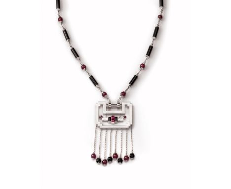 


AN 18K FRENCH WHITE GOLD, DIAMOND, RUBY AND ONYX NECKLACE, CARTIER 
Paris, circa 1980 
The onyx alternated by ruby bead ne