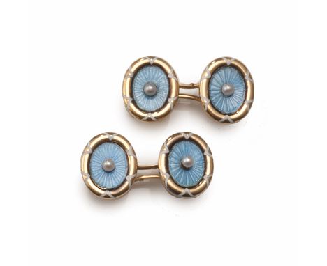 


A PAIR OF 8K ENGLISH GOLD, BLUE ENAMEL AND PEARL CUFF LINKS, ART DECO 
Circa 1925 
The double cuff-links set with pale blu