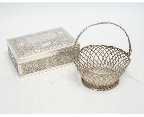 An Indian white metal mounted rectangular cigarette box, with engraved inscription, 'From St. Joseph's College Cricket Team, 