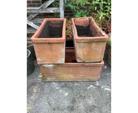 Four rectangular terracotta garden trough planters, width 85cm, depth 36cm, height 36cm.  Condition - fair
