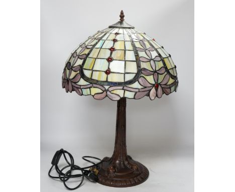 A reproduction Tiffany style table lamp, approximately 60cm high. Condition - good
