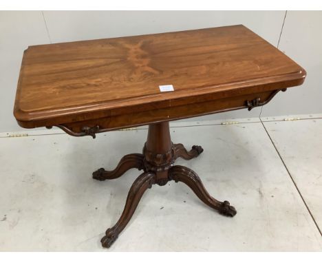 An early Victorian rosewood folding card table, width 92cm, depth 46cm, height 74cm.  Condition - fair