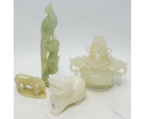 Four Chinese bowenite jade pieces including carving of a bird, largest 20cm. Condition - fair