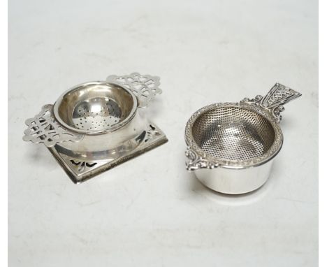 An Elizabeth II silver tea strainer and stand, with Celtic decoration, by Mappin &amp; Webb, Sheffield, 1962, 10.7cm and one 