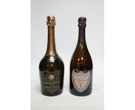One bottle of Moet et Chandon Dom Perignon vintage champagne 1993 and one bottle of Laurent Perrier, both boxed. Condition - 