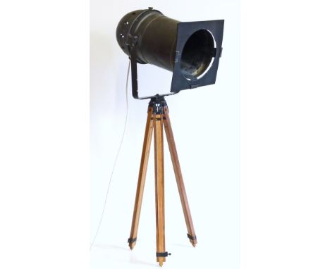 Stage can light by Thomas mounted on wooden camera tripod. Unfortunately we are not doing condition reports for this sale.